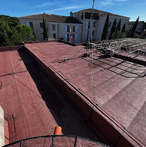 Pose d'un complexe d'étanchéité bi-couche et pose d'un carrelages sur plots réglables